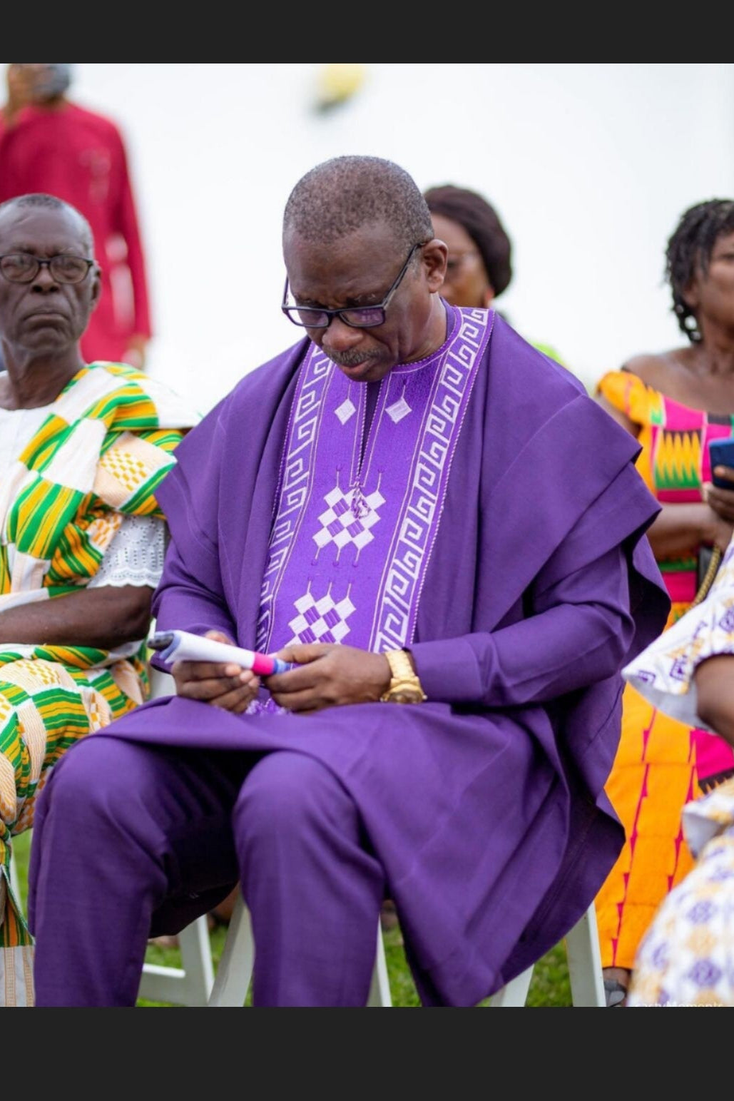 Purple men's father-in-law wedding agbada