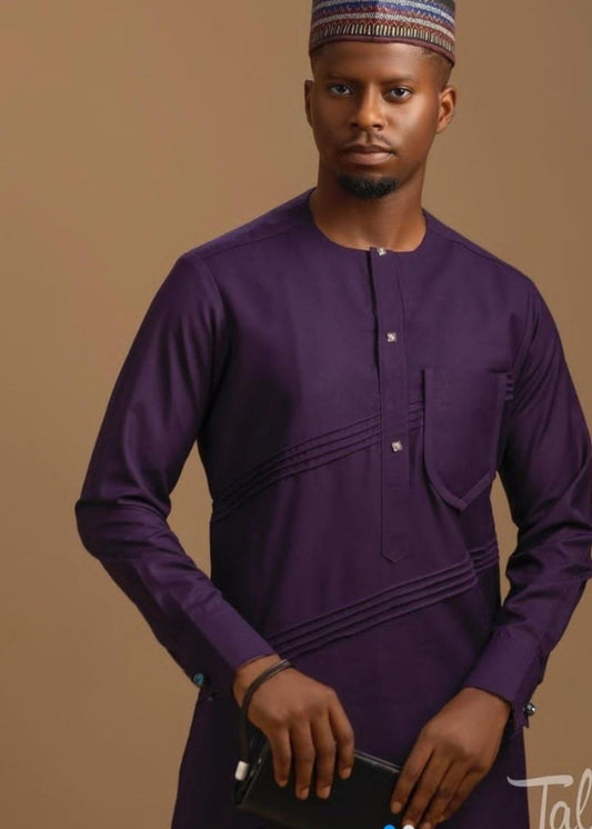 man wearing a purple African suit. perfectly styled.