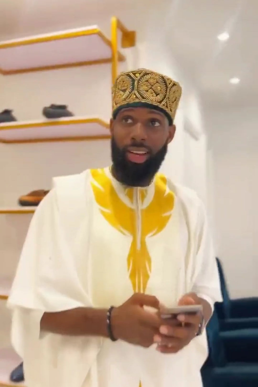 White African men's agbada with gold embroidery