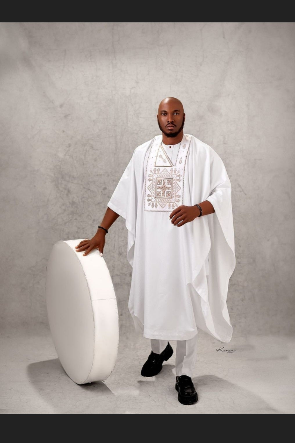 man wearing white embellished agbada