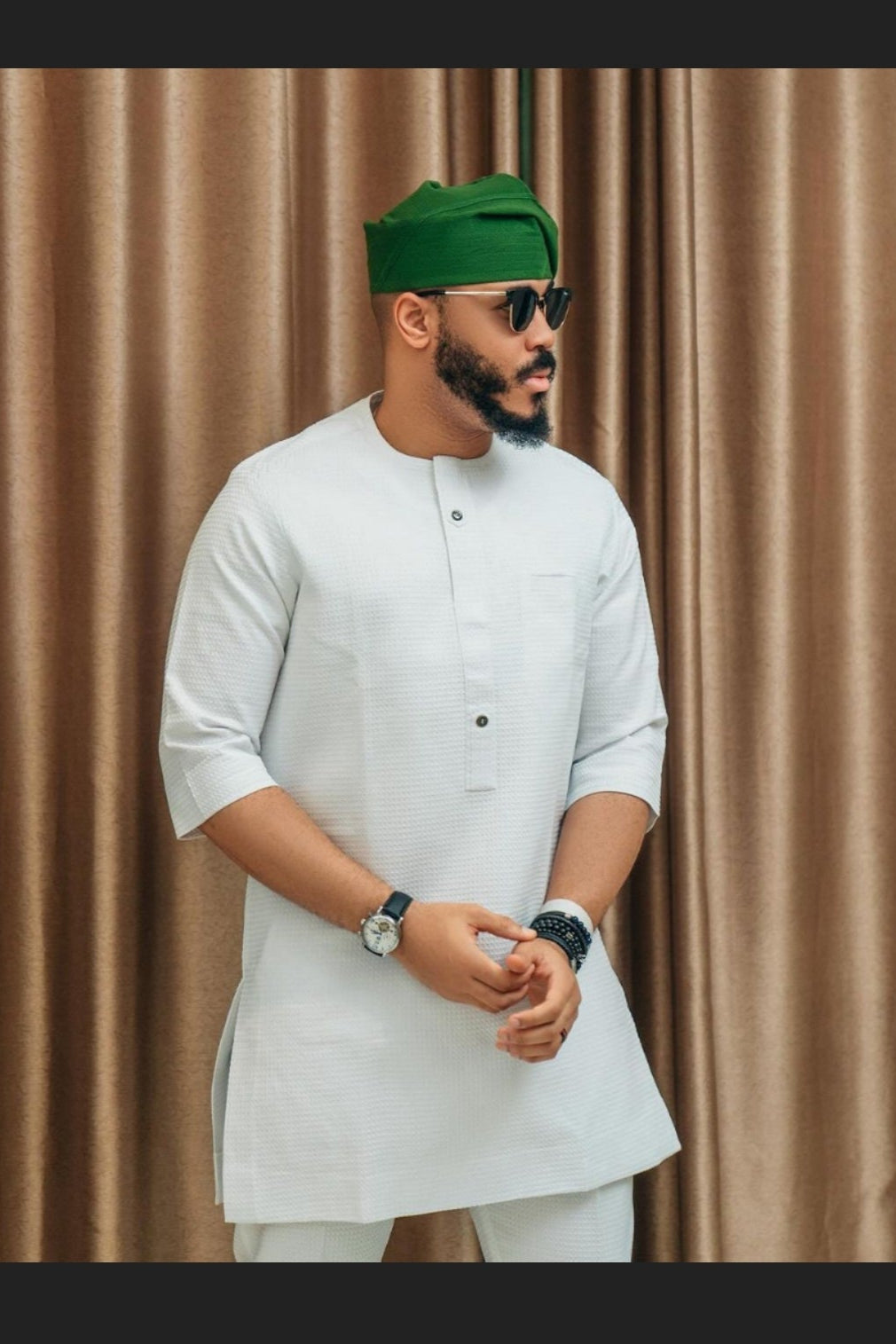 MAN IN TRENDY AFRICAN WHITE SHIRT AND PANTS